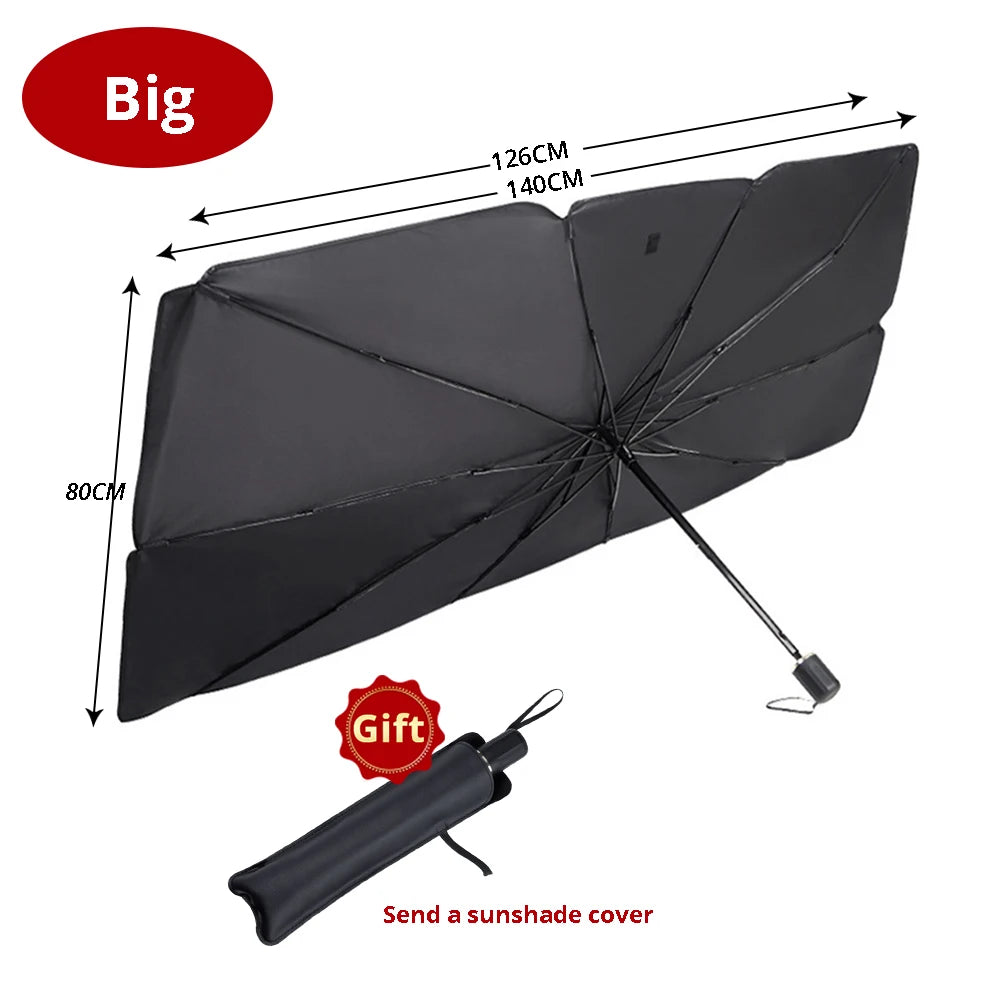 Un grand pare-soleil pliable noir pour voiture avec poignée et étiquette cadeau.