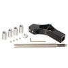 A set of adjustable car gear shifter extension kit components including various sized tubes and a metal rod.
