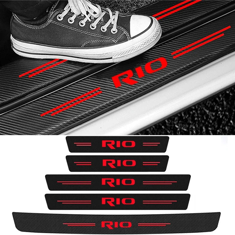 Black carbon fiber decals featuring the RIO logo applied to a car door threshold.