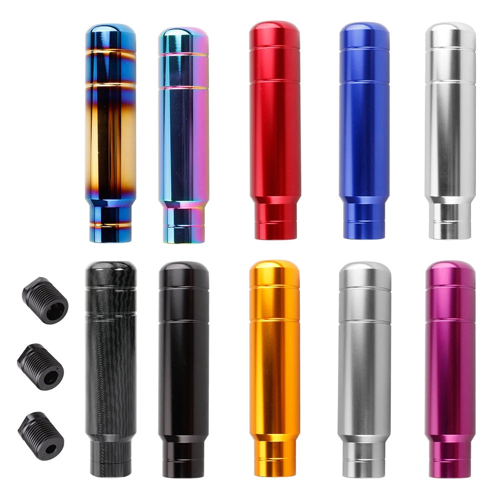 A set of JDM style aluminum gear shift knobs in various colors including black, silver, red, blue, and purple.