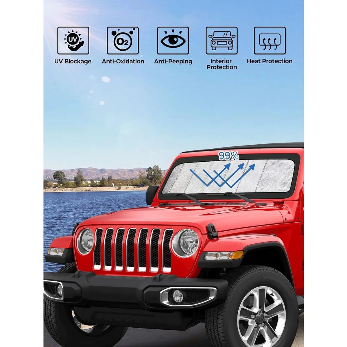 A red Jeep Wrangler with a folded windshield sunshade installed, showing various protection features.