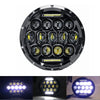 A close-up view of a 7 inch motorcycle LED headlight assembly with multiple projector lenses.