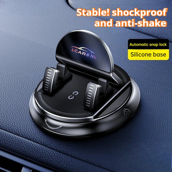 A black silicone base phone mount with an automatic snap lock mechanism shown on a car interior surface.