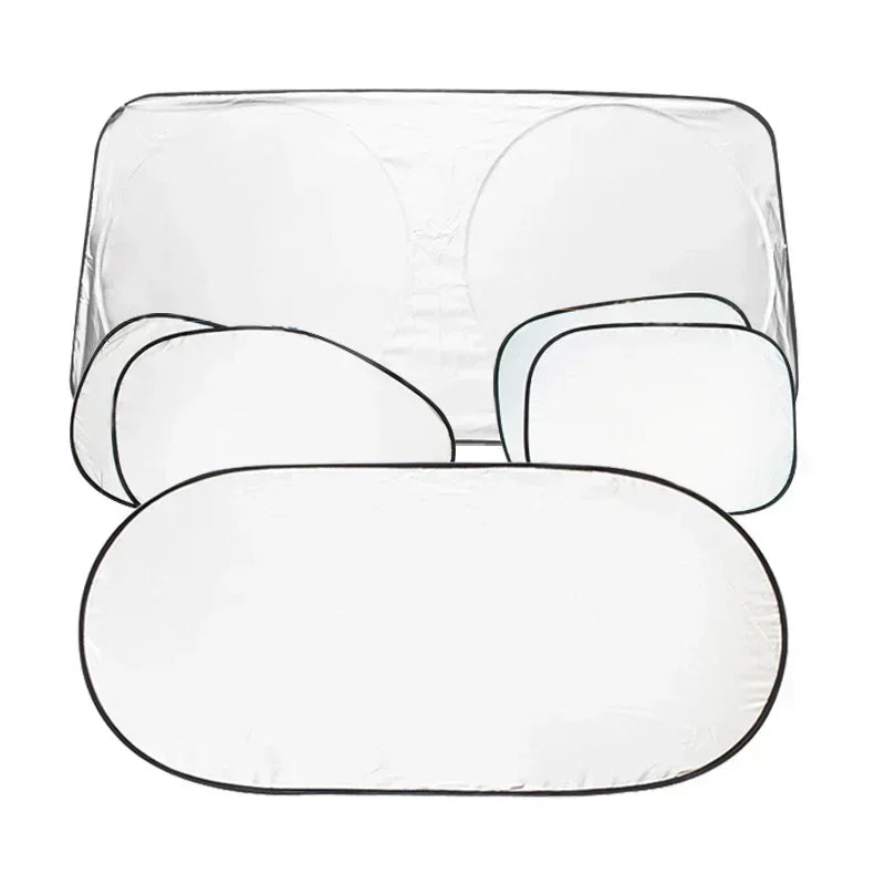 A set of six clear car windshield sun shades folded and displayed on a white background.