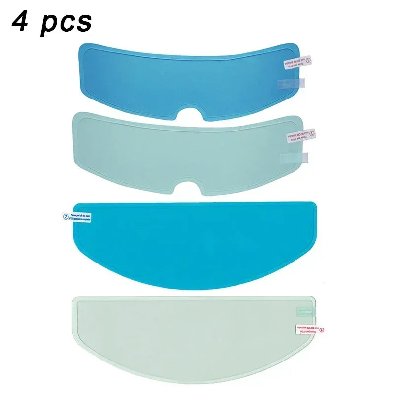 Four pieces of anti-fog and rain-repellent motorcycle helmet visor film in various shades of blue and green.