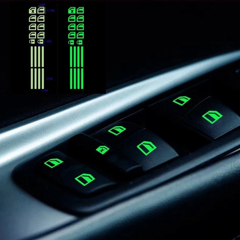 Close-up of car window luminous button stickers with green and white indicators on a dark panel.