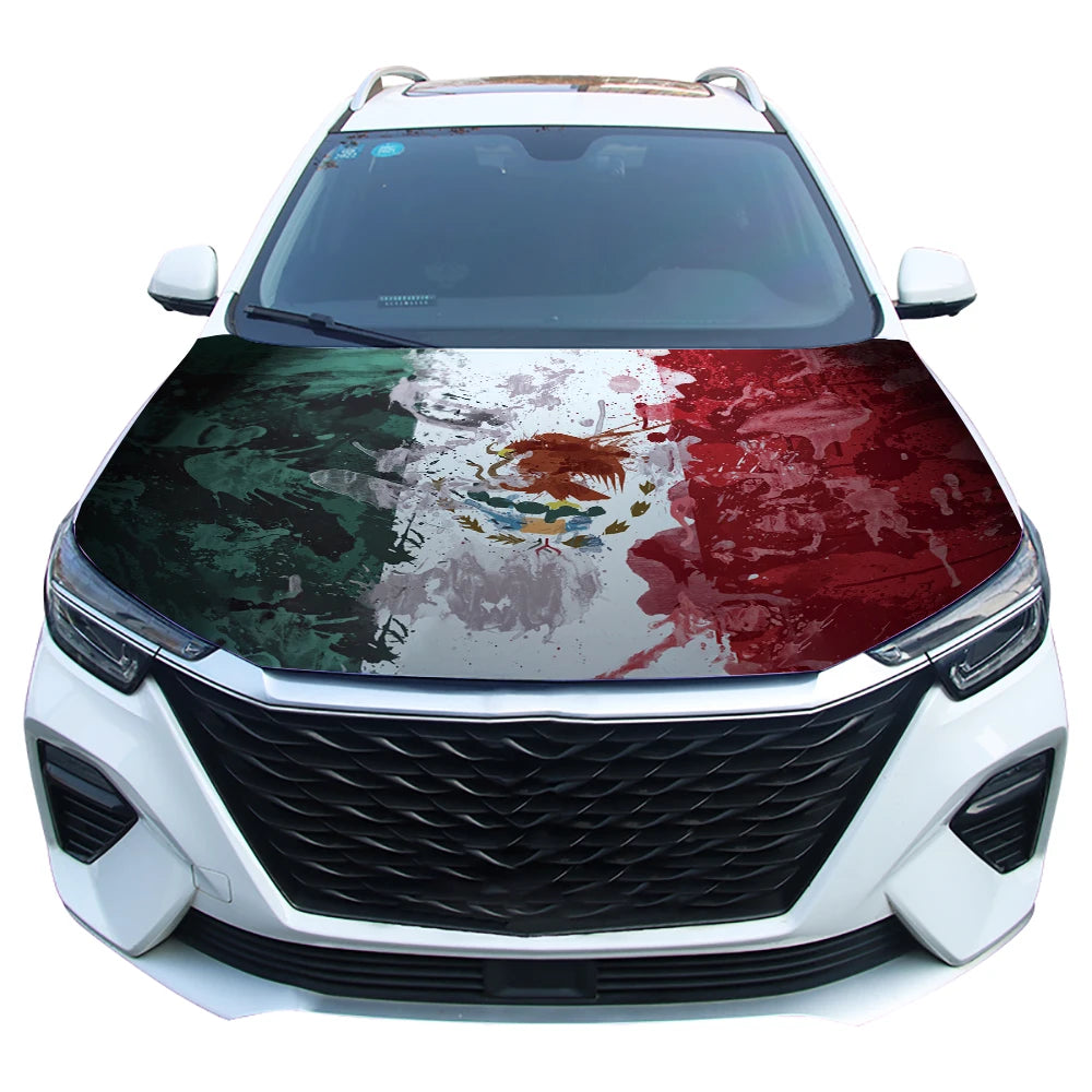A white car hood covered with a design featuring the Mexican flag colors and coat of arms.