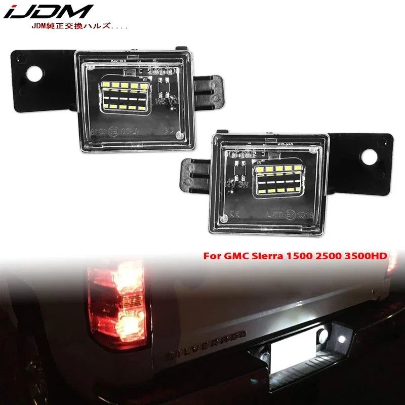 OEM style license plate lights for GMC Sierra trucks shown next to the installed light.