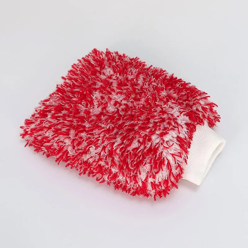 A bright red microfiber cleaning glove with white trim, showing a fluffy texture.