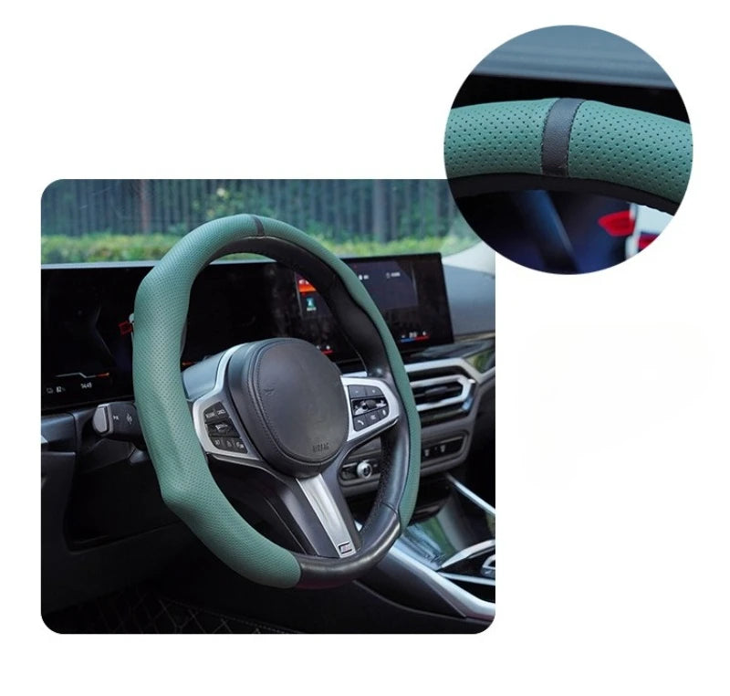 A close-up view of a green steering wheel cover on a car's steering wheel.