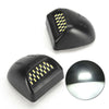 A black high brightness 18 LED license plate light assembly with a clear lens.