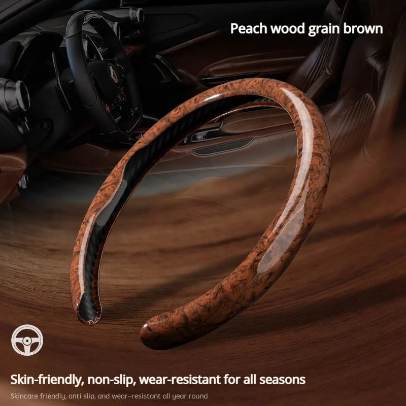 A close-up of a peach wood grain brown steering wheel cover shown inside a car interior.