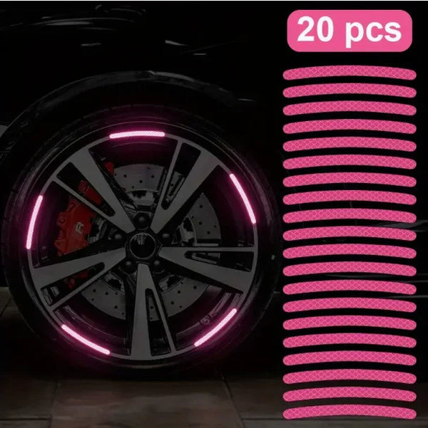 A close-up view of a black wheel with pink reflective decals and a quantity indicator showing 20 pieces.