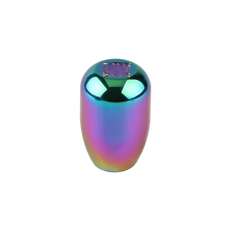 A shiny, iridescent blue and purple aluminum gear shift knob for a manual transmission.