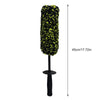A heavy-duty wheel barrel brush with a black handle and a dense, bright yellow-green bristled head.