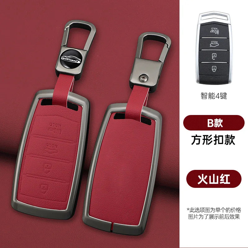 A pair of red car key cases with silver metal clasps and black electronic features displayed on a maroon background.