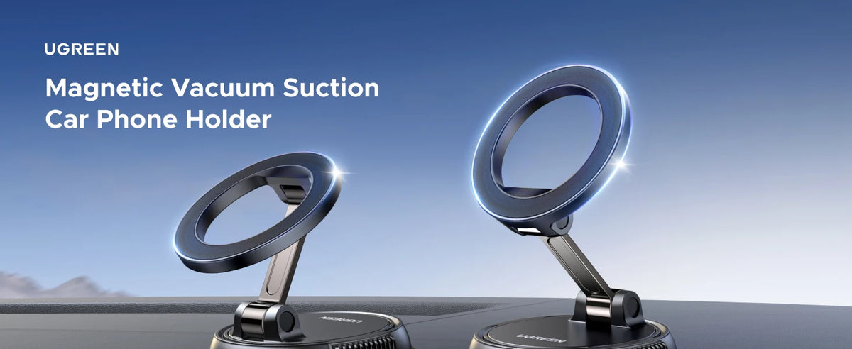 A close-up view of a UGREEN magnetic vacuum suction car phone holder with a silver ring mount.