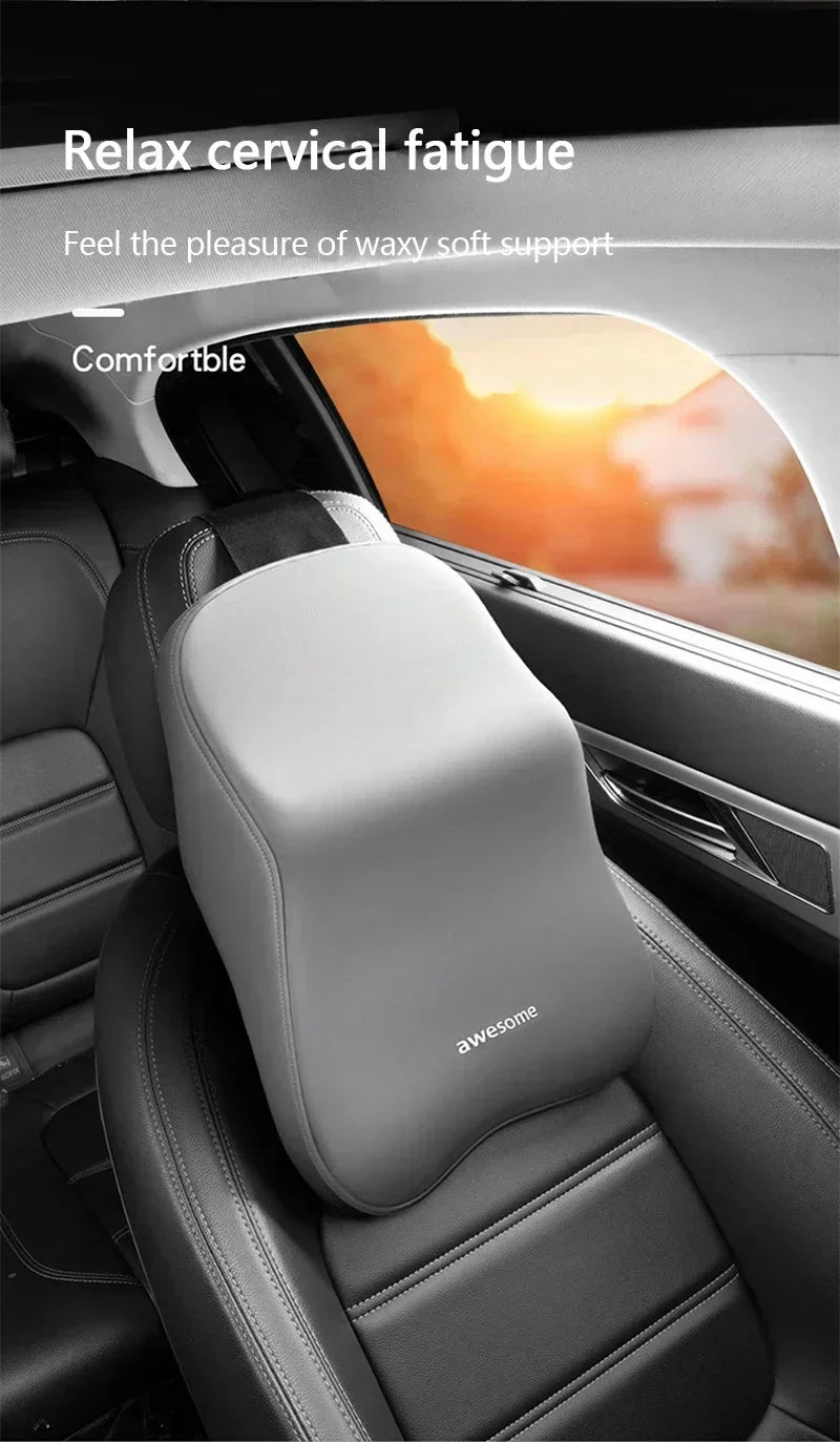 A gray ergonomic car headrest cushion is shown in a car interior, designed to relieve cervical fatigue.