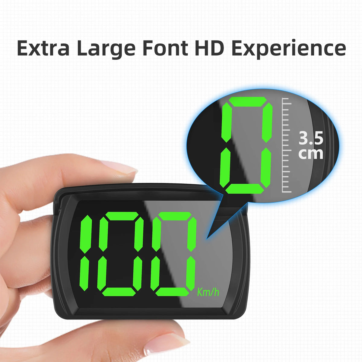 Une main tient un compteur GPS noir avec un écran HD vert affichant 100 Km/h.