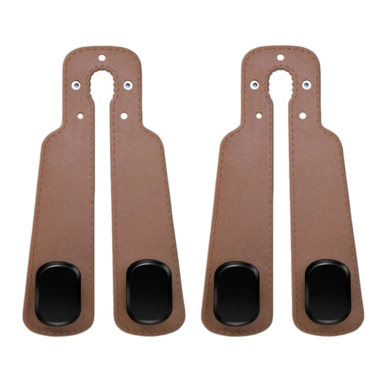A pair of brown leather car headrest hooks designed for storage organization.