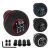 A set of universal 5-speed gear shift knobs for manual and automatic transmissions, featuring black and red accents.