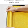 A hand is holding a bright yellow, thick, double-sided microfiber towel.