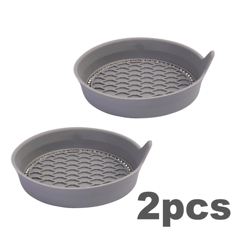 Two gray silicone rhinestone car cup holder coasters with textured bottoms