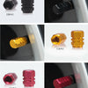 A set of four hex aluminum alloy tire valve caps in black, gold, and red colors shown individually and in context.