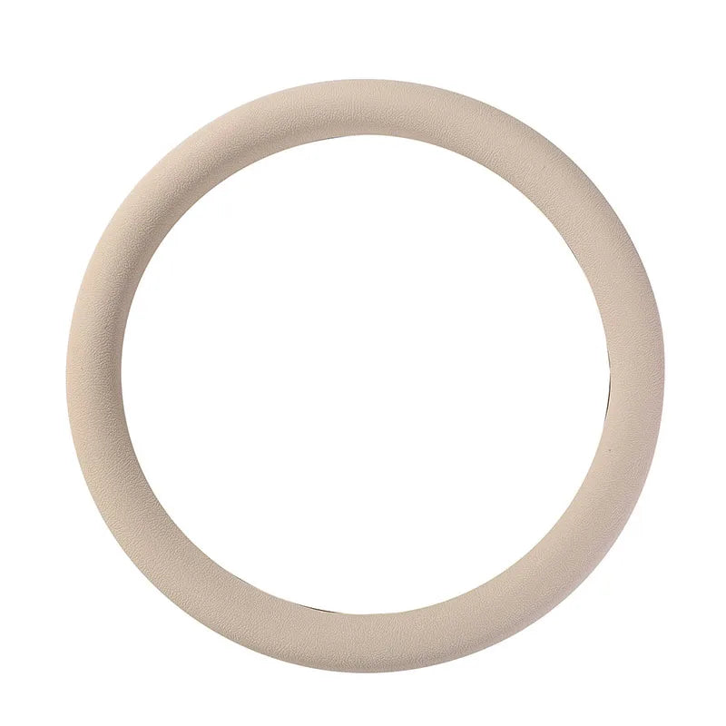 A beige ultra-thin silicone steering wheel cover shown in a circular view.