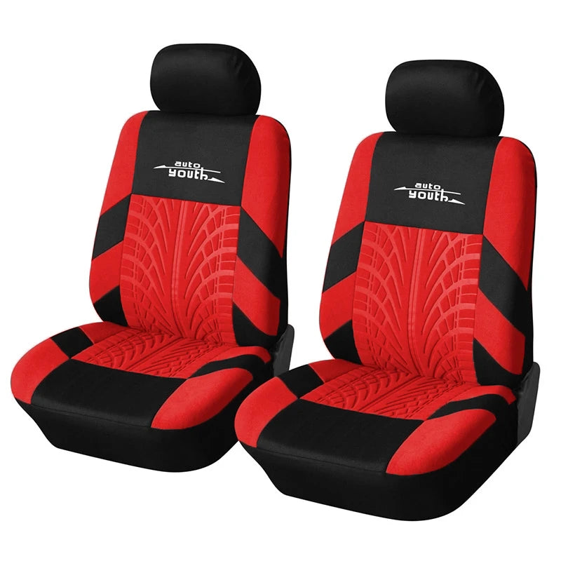A pair of red and black auto youth car seat protector covers shown side by side.