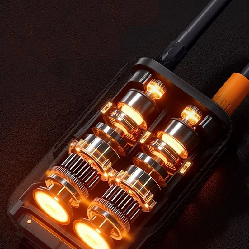 Close-up of a black portable tire inflator with multiple illuminated orange-toned inflation nozzles.