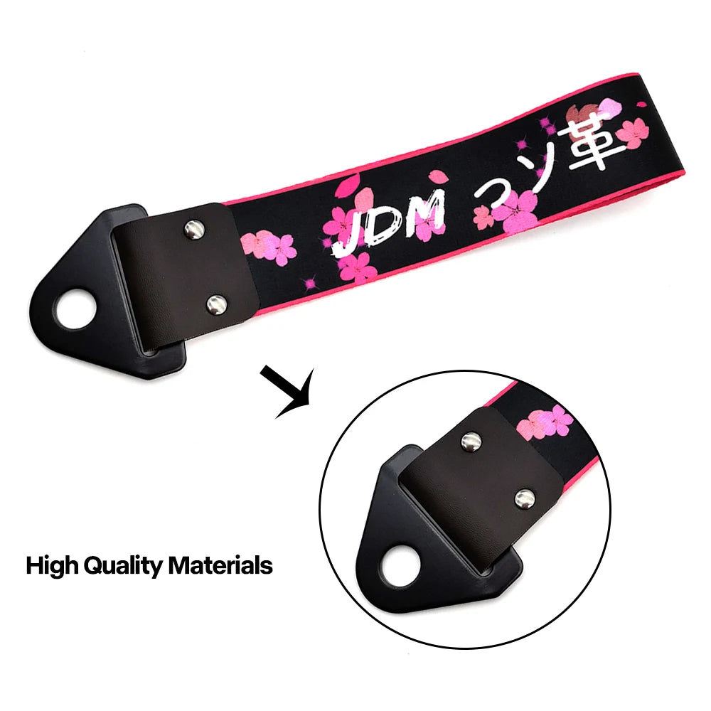 Black and pink patterned tow strap with metal hardware for vehicle and motorcycle use