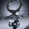 A close-up view of a foldable magnetic car mount demonstrating 1080 degrees free rotation.
