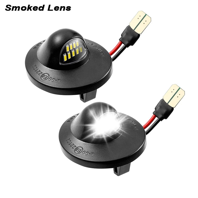 A black smoked lens high-intensity LED light fixture with a connector cable.
