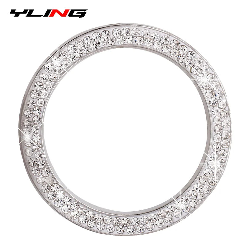 Silver circular button cover decorated with clear rhinestones and diamonds