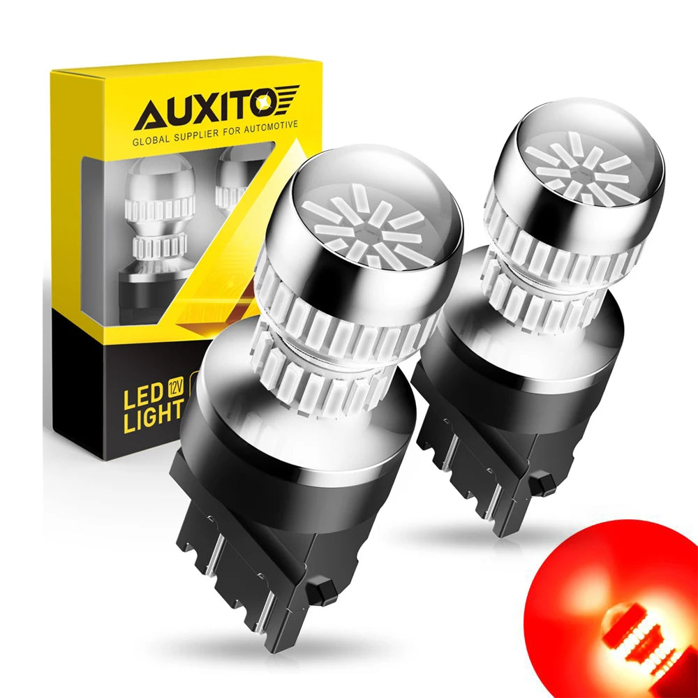 A box and three black LED light bulbs with clear lenses are shown for vehicle signals.