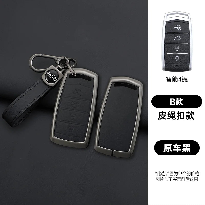 A set of four black zinc alloy car key cases with leather straps and a silver key shown against a dark background.