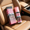 A bottle of interior detailer spray and a box are placed on a tan car seat.