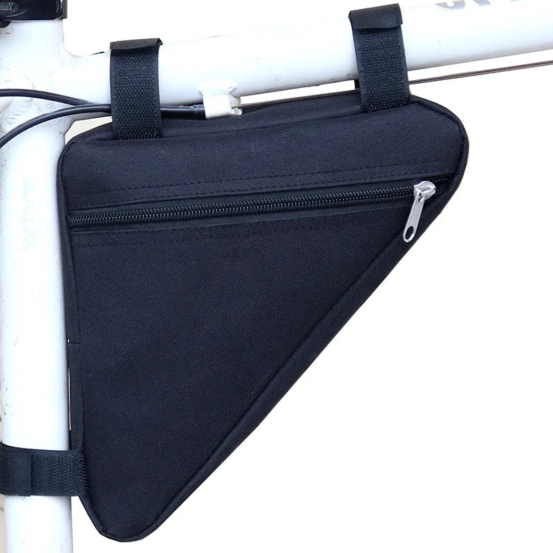 Black convertible waterproof bike frame bag attached to a white bicycle frame.