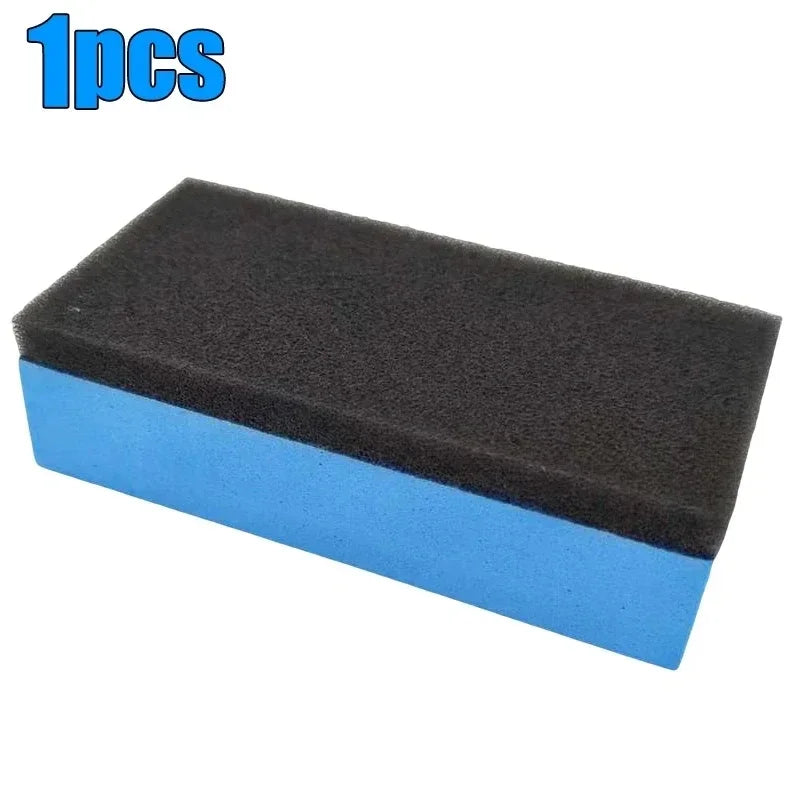 A rectangular block of black and blue automotive scratch and swirl remover polish.