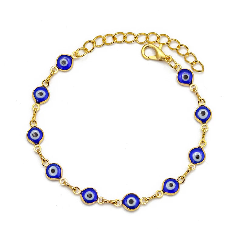 Gold plated evil eye charm bracelet featuring blue and white circular charms on an adjustable link chain