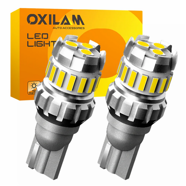 A pair of Oxilam LED light automotive backup and reverse lights with silver housings.