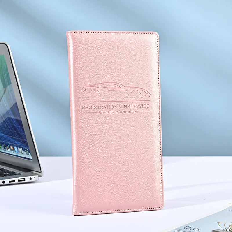 A pink premium PU leather vehicle organizer wallet featuring a car silhouette and text for registration and insurance documen