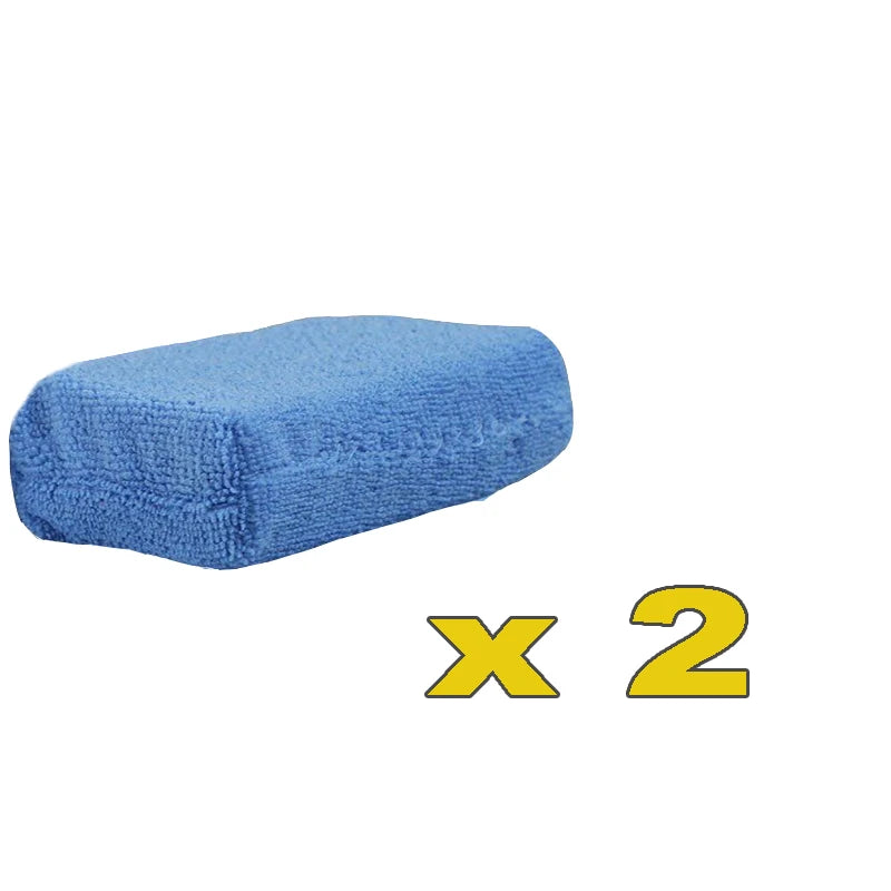 Two blue microfiber car wax applicator pads for polishing and waxing.