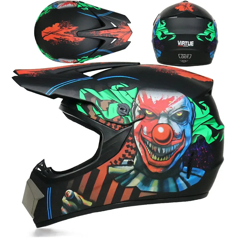 A black and orange kids motorcycle off-road safety helmet with a fierce clown face design.