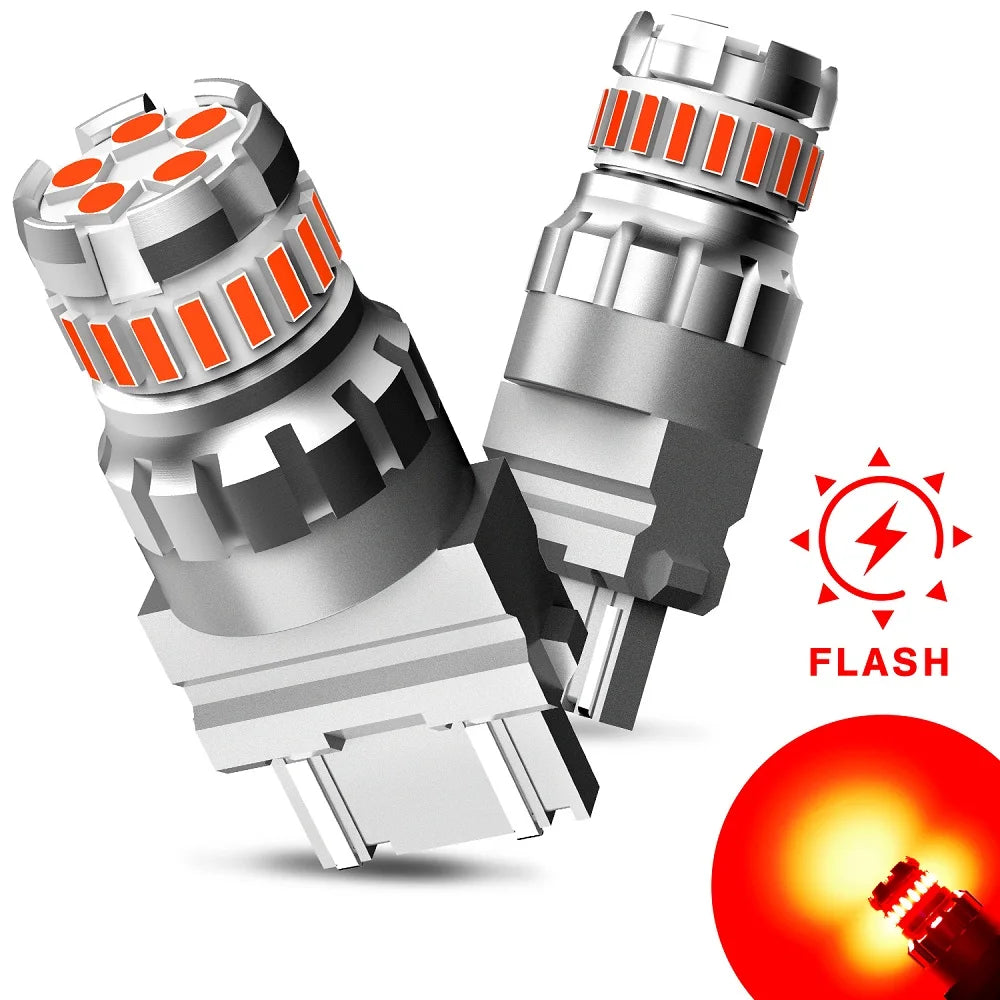 A silver LED brake strobe flashing car tail light assembly with an orange lens and a close-up of the light emitting bright re