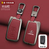 A pair of red leather car key covers for Lexus vehicles shown with a smart remote control.
