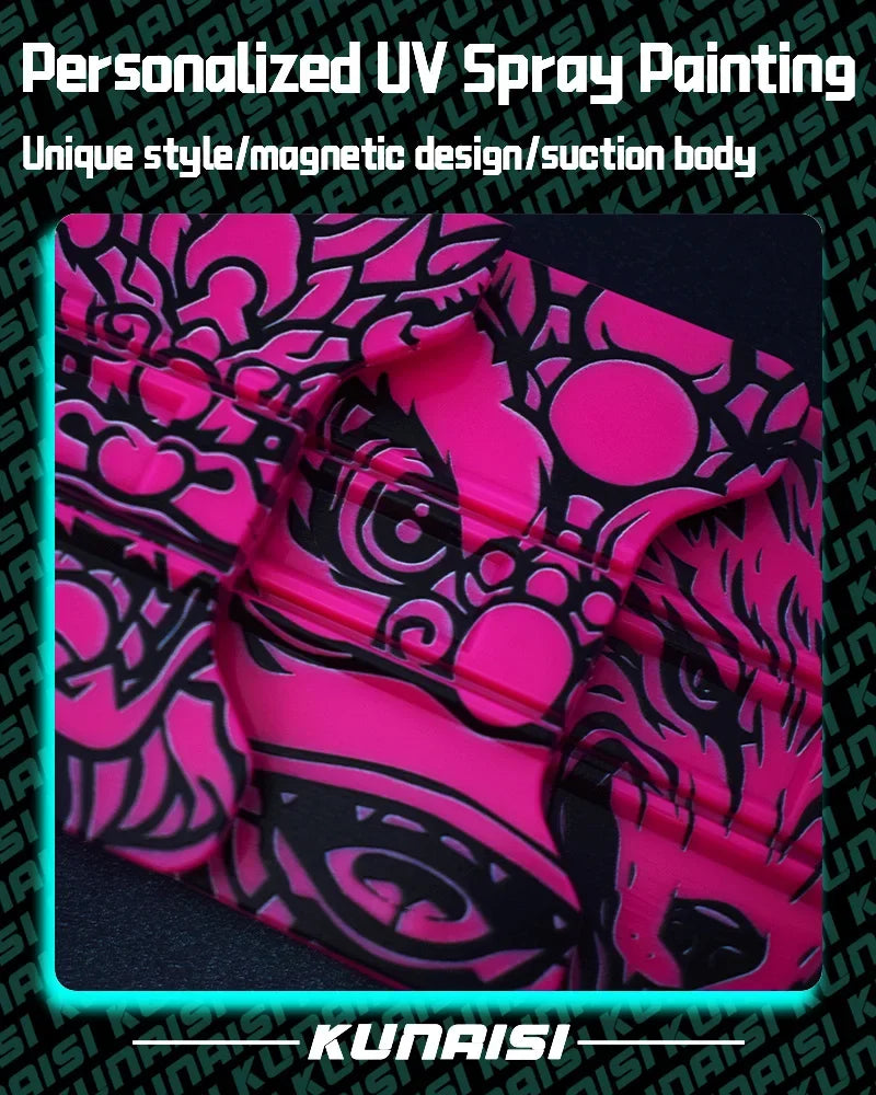 Close-up of a personalized UV spray painting design on a black surface featuring pink and black swirling patterns.