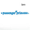 Blue text spelling out passenger princess with a crown and stars