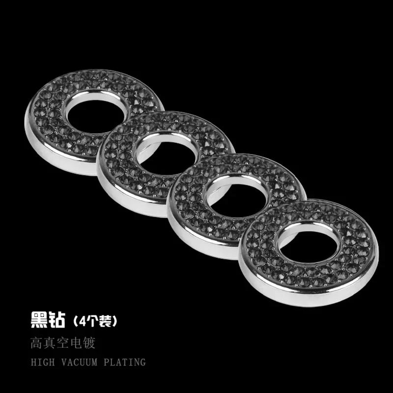 A set of four silver-toned rhinestone door lock decorations with a circular design.